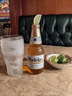 Modelo and complimentary pickles