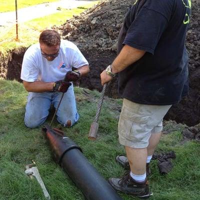 A pipe bursting installation.  This is a trenchless way to repair or enlarge a pipe.  http://nupipelining.com/pipe-bursting.html