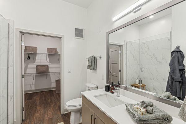 Spacious bathrooms with walk-in closets for effortless organization