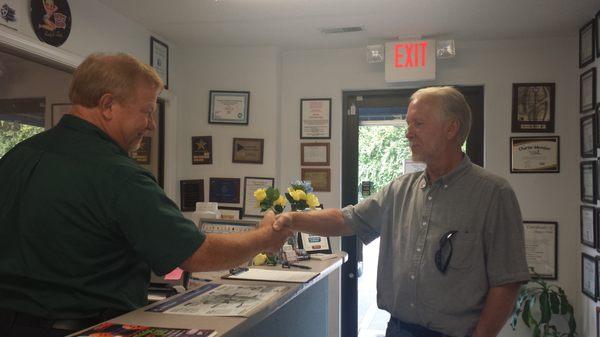 Doing business the old fashion way with a handshake and smile