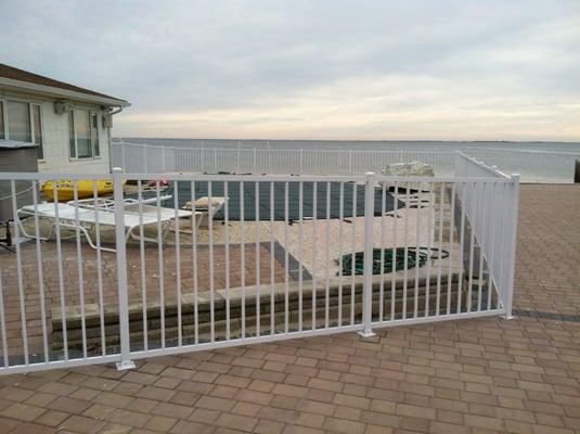 White Aluminum Pool Code Fence on Pavers