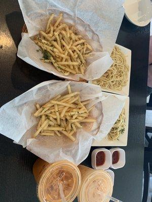 Garlic fries, regular fries, Thai tea, and Garlic noodles