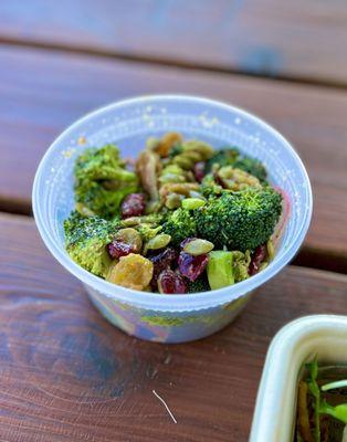 Broccoli salad with raisins, cranberries, and pine nuts - delightful and refreshing!