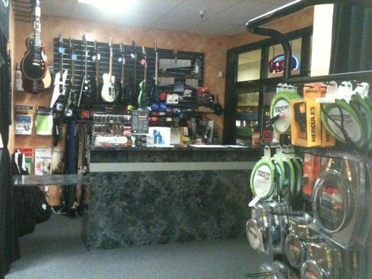 A view inside the waiting area.  They also sell instruments and accessories.