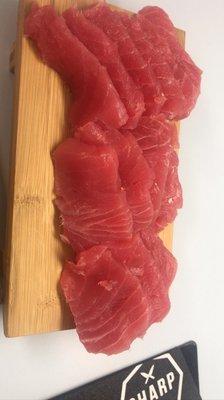 Yellowfin tuna. Sashimi style. That's part of 1 lb. wayyyy cheaper than getting it from a restaurant