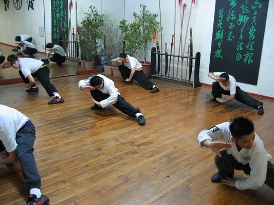 Students practicing basic stances during warm up excercises