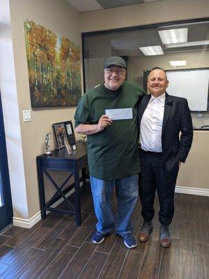 An awesome picture with my lawyer who got me a check for $8, 333 dollars. The law offices of Timothy Combs in Riverside.