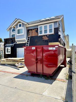 15 yard dumpster rental in North park San Diego for a siding replacement on a apartment complex