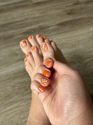 Manicure and pedicure with regular polish.