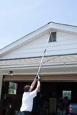 Wasps entering peak of this garage.