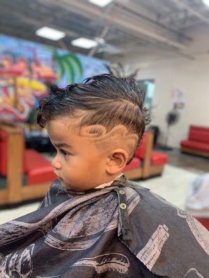 Skinfade freestyle design on combover for a child