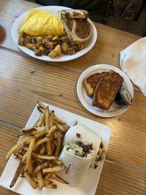 Above: build your own omelet with rye toast and potatoes. Middle: cornbread Below: Caesar salad wrap with bacon and fries