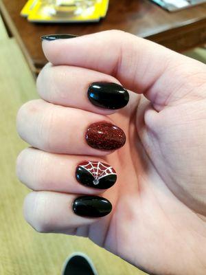 LOVE these black and sparkly red nails for a Halloween wedding