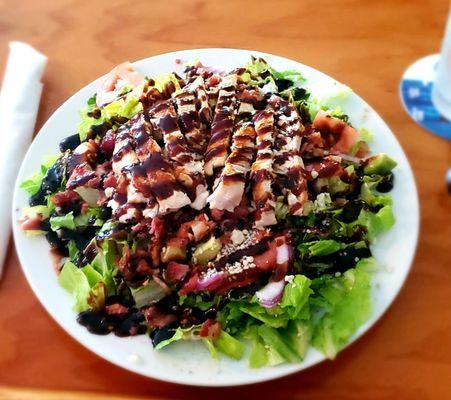 Chicken avocado salad with bacon and balsamic drizzle. OMG so good. Huge!! Had enough for a meal next day.