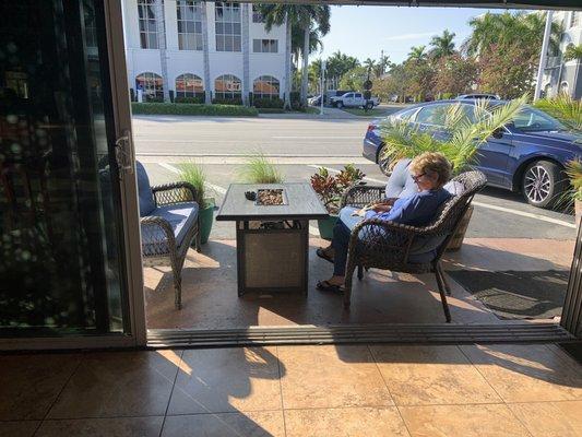 Better view of outside tables on Tamiami Trl..the other side of tables and seats facing the side street had dirtier cushions.