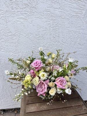 Organic and whimsical style arrangement.