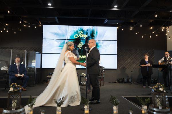 Fully standing before my husband to be at the altar. My goal was reached!