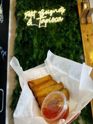 Fried vegan spring rolls with sweet and sour chili sauce!