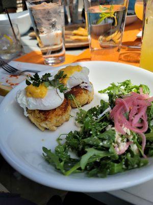 Crab cakes with eggs benedict & a side of greens.