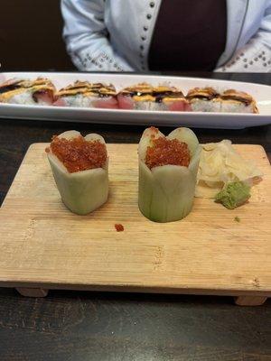 Tobiko - flying fish roe served in cucumber.