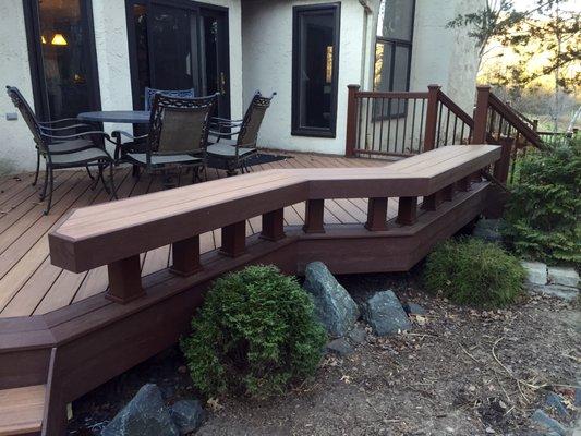 A custom deck and bench built by Waterstone