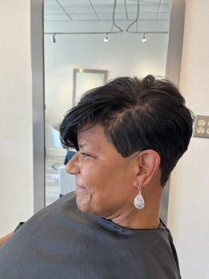 A happy client short and sassy hairstyle