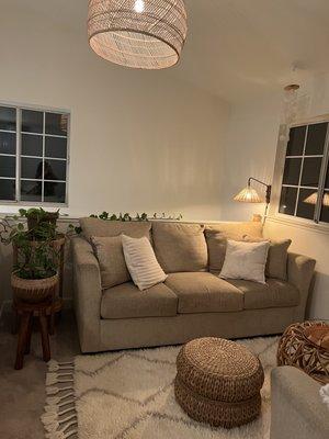 Seagrass pouf, rattan sconce light and wood stool in my loft