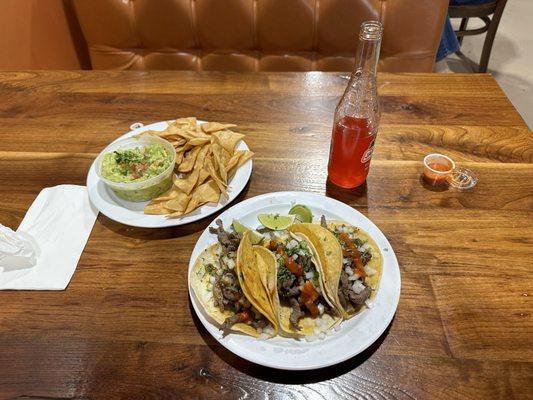 Fresh chips with guacamole, and steak tacos