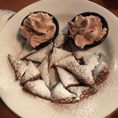 Complimentary dessert of beignets with the best chocolate mousse