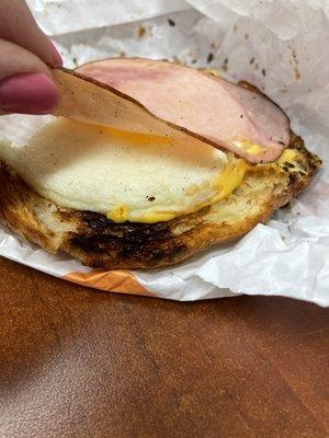 $4 for this ham egg and cheese croissant.  Only one slice of thin ham