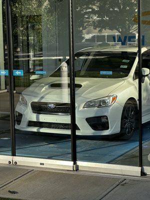 2017 Subaru WRX coming out of the car vending machine.