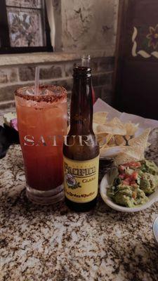 Michelada with a side of Guacamole & chips.