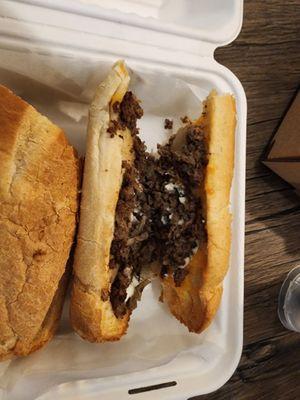 A $14 cheesesteak that bqrely had any damn meat.  NOT worth the price!