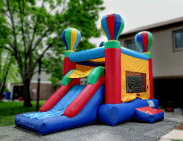 13 X 21 with a basketball hoop inside.  Perfect for younger children.