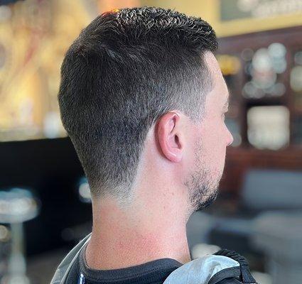 Half fade tapered haircut.