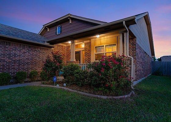 Twilight photo of a home with a sky replacement taken in Norman Oklahoma.