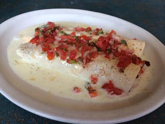 Cheese-steak burritos with white cheese sauce and pico de gallo, my favorite!