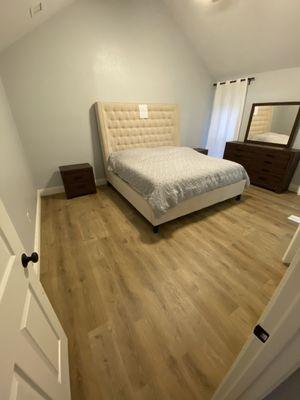 New vinyl plank flooring in bedroom