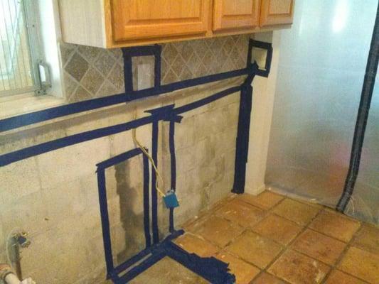 Kitchen area under containment for mold removal