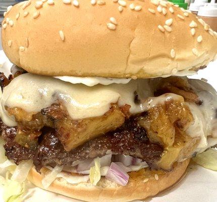 The P.B.J. - Sweet and savory pineapple bacon jam on top of an Angus Beef smash patty with lettuce, mayo and red onions.