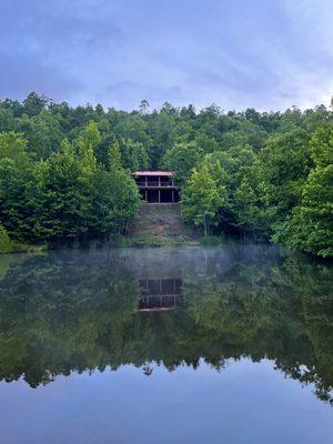 Looking at the cabin across the private fishing pond