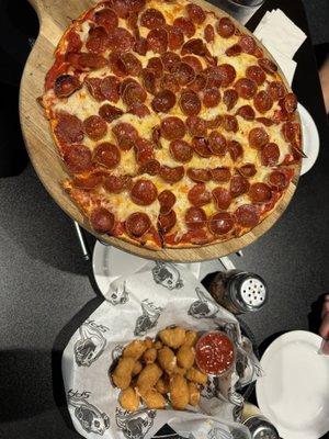 Pepperoni pizza and cheese curds