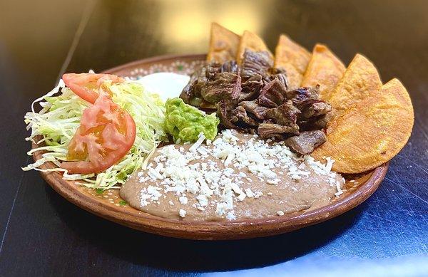 Enchiladas potosinas with fajita.