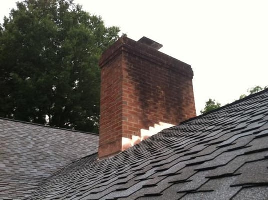 New Copper Flashing around chimney with a closer look of Presidential Shingles.