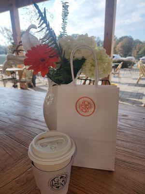 Our scones and coffee with a beauty of a bouquet on our table.