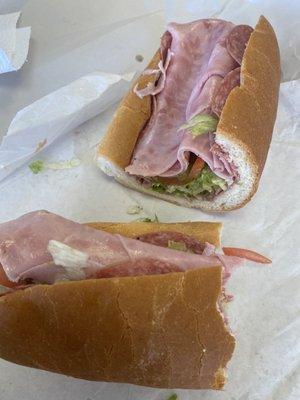 A regular large sandwich without onions or peppers