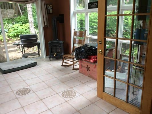 This little sunroom was mostly used for storage and the dog bed.