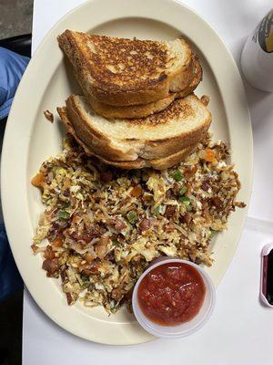 Texas hash with bacon. Ask for sourdough toast grilled, it's a game changer!!