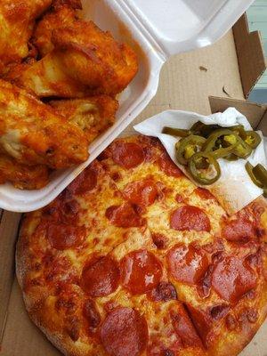 Greasy pizza and frozen microwave Tyson wings