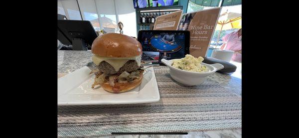 Mushroom Swiss Burger with side of potato salad. Might want to split it.